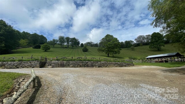 973 Sitting Rock Trl, Cullowhee, NC 28723 - view of dirt / gravel road featuring a rural view