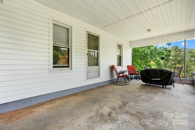 715 Broadway St NW, Lenoir, NC 28645 - view of patio with a grill and a carport