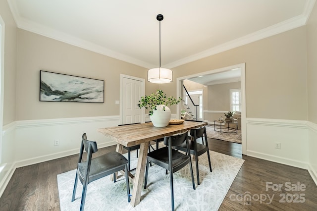 2907 Notchview Ct, Charlotte, NC 28210 - dining space featuring stairs, crown molding, dark wood-style floors, and baseboards