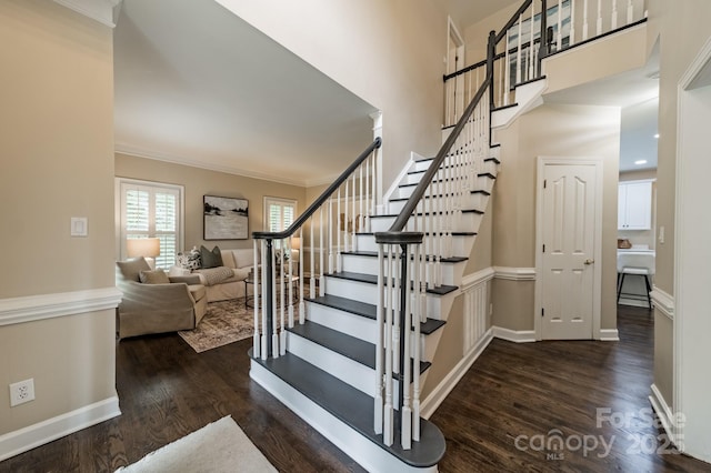 2907 Notchview Ct, Charlotte, NC 28210 - stairway with wood finished floors, ornamental molding, and baseboards