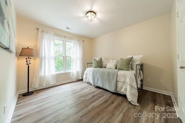 2907 Notchview Ct, Charlotte, NC 28210 - bedroom featuring wood finished floors and baseboards