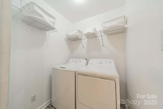 2907 Notchview Ct, Charlotte, NC 28210 - laundry area with separate washer and dryer and baseboards