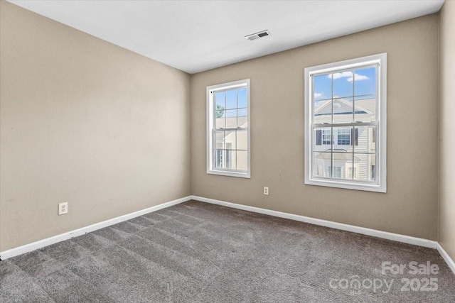 8610 Sawleaf Ct, Charlotte, NC 28215 - carpeted spare room featuring baseboards