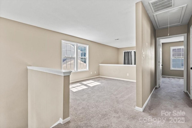 8610 Sawleaf Ct, Charlotte, NC 28215 - carpeted spare room with attic access and baseboards