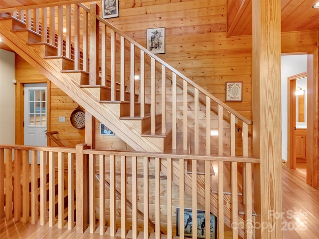421 Ramp Patch Ln, Waynesville, NC 28786 - staircase with wooden walls and wood finished floors