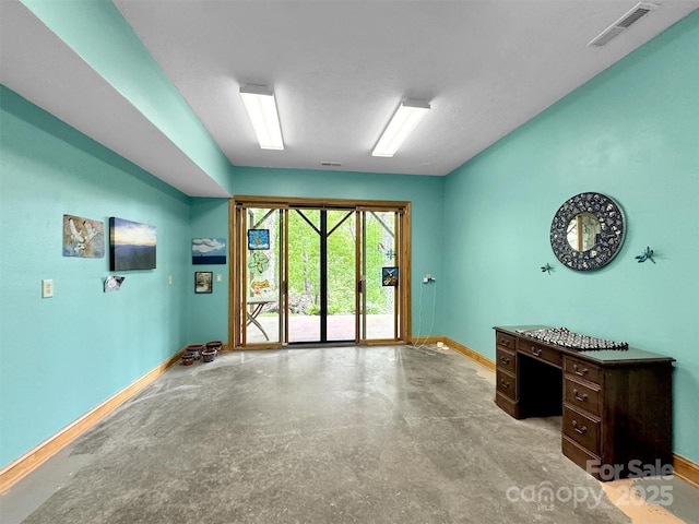 421 Ramp Patch Ln, Waynesville, NC 28786 - unfurnished room with baseboards and finished concrete floors