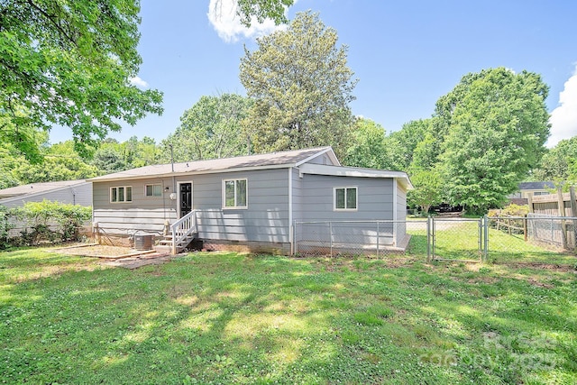 2409 Thornton Rd, Charlotte, NC 28208 - back of property with a gate and central AC unit