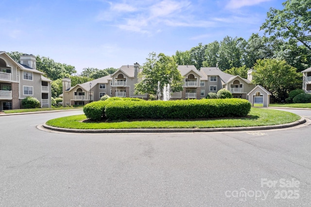 view of front of property with a residential view