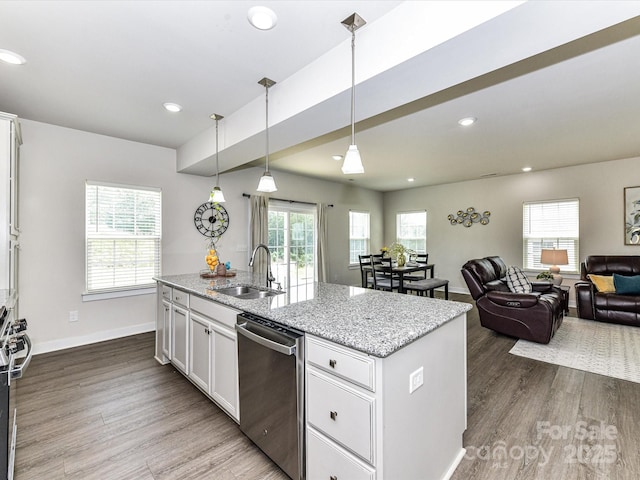 3023 Ballester Rd, Fort Mill, SC 29707 - kitchen with a sink, stainless steel appliances, dark wood-style flooring, white cabinets, and light stone countertops