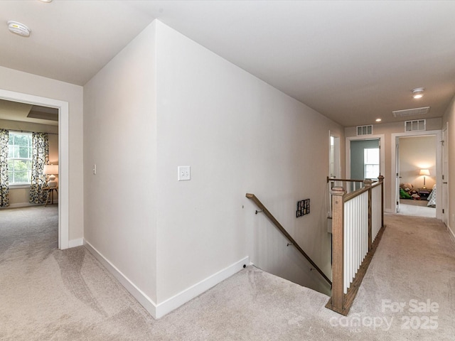 3023 Ballester Rd, Fort Mill, SC 29707 - hall with an upstairs landing, carpet flooring, and baseboards