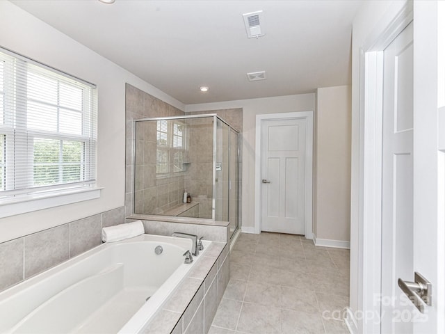 3023 Ballester Rd, Fort Mill, SC 29707 - bathroom with a bath, a stall shower, tile patterned floors, baseboards, and recessed lighting