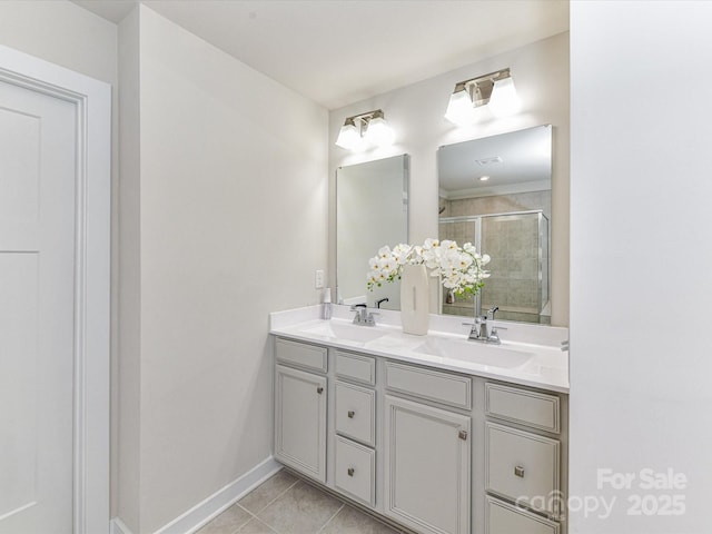 3023 Ballester Rd, Fort Mill, SC 29707 - full bath with double vanity, tile patterned flooring, a shower stall, and baseboards