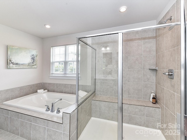 3023 Ballester Rd, Fort Mill, SC 29707 - full bathroom featuring a bath, a shower stall, and recessed lighting