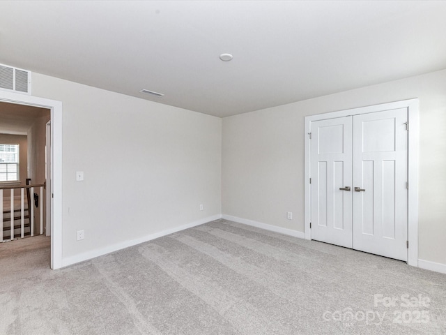 3023 Ballester Rd, Fort Mill, SC 29707 - unfurnished bedroom with carpet, baseboards, and a closet