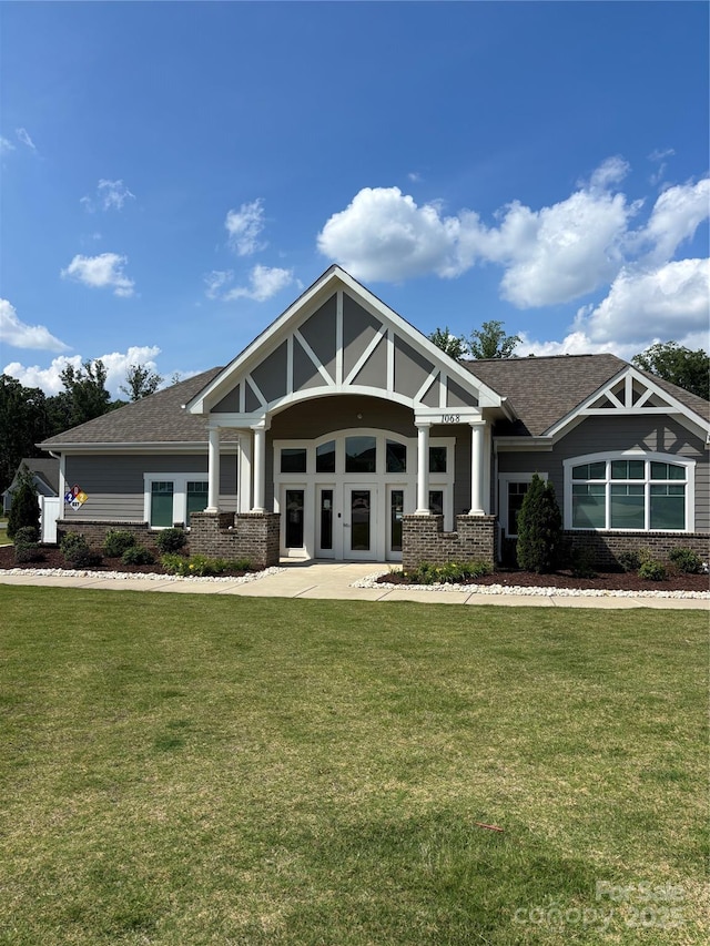 3023 Ballester Rd, Fort Mill, SC 29707 - view of front of property featuring a front lawn, roof with shingles, and brick siding