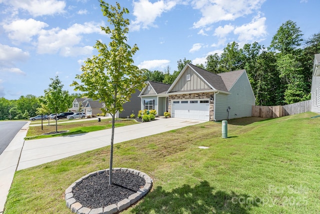 craftsman house with board and batten siding, concrete driveway, stone siding, and a garage