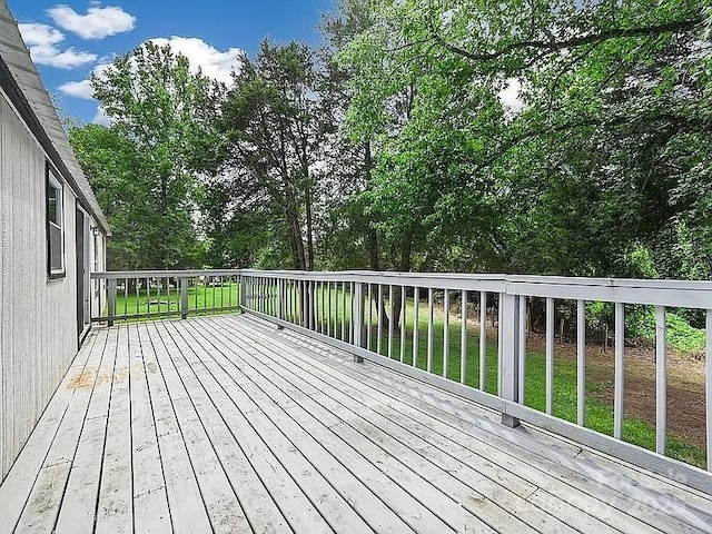 10379 Turnplow Dr, Davidson, NC 28036 - wooden deck featuring view of wooded area