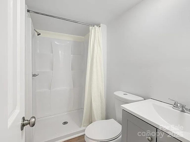 10379 Turnplow Dr, Davidson, NC 28036 - bathroom with toilet, a shower with shower curtain, and vanity