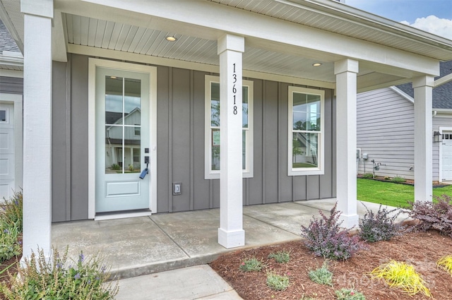 13618 Tranquil Day Dr, Matthews, NC 28105 - property entrance featuring board and batten siding and covered porch