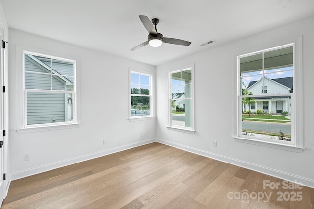 13618 Tranquil Day Dr, Matthews, NC 28105 - unfurnished room featuring light wood finished floors, baseboards, and ceiling fan
