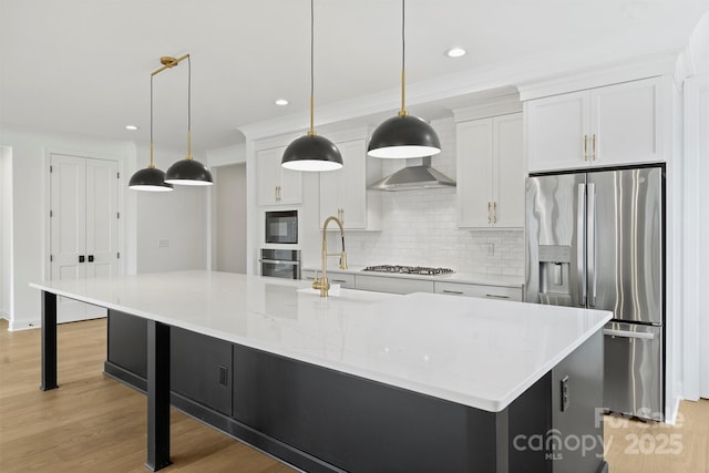 13618 Tranquil Day Dr, Matthews, NC 28105 - kitchen with appliances with stainless steel finishes, decorative backsplash, white cabinetry, light wood-style flooring, and recessed lighting