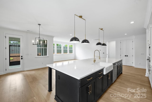 13618 Tranquil Day Dr, Matthews, NC 28105 - kitchen featuring a sink, dark cabinets, dishwasher, light wood-type flooring, and recessed lighting
