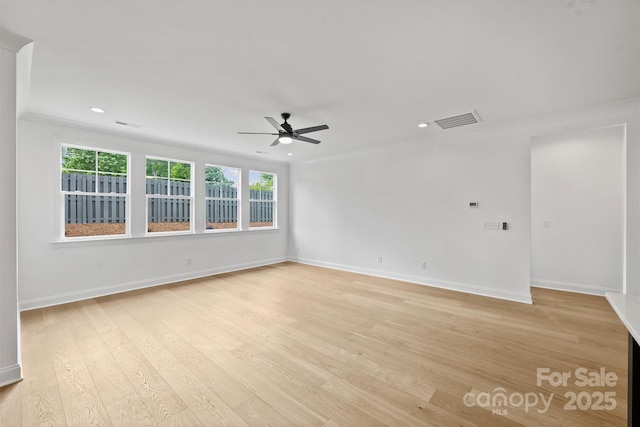 13618 Tranquil Day Dr, Matthews, NC 28105 - spare room with a ceiling fan, light wood-style floors, baseboards, recessed lighting, and ornamental molding