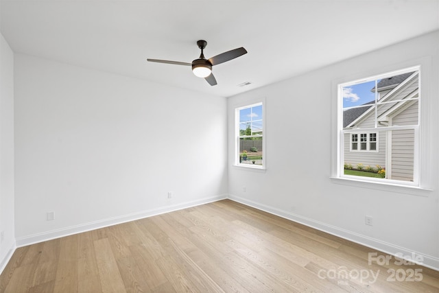 13618 Tranquil Day Dr, Matthews, NC 28105 - unfurnished room featuring light wood-type flooring, baseboards, and ceiling fan
