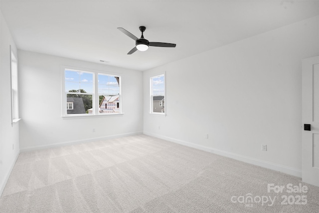13618 Tranquil Day Dr, Matthews, NC 28105 - spare room with baseboards, a ceiling fan, and carpet flooring