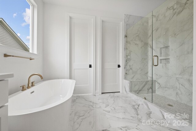 13618 Tranquil Day Dr, Matthews, NC 28105 - bathroom featuring marble finish flooring, a freestanding tub, and a marble finish shower