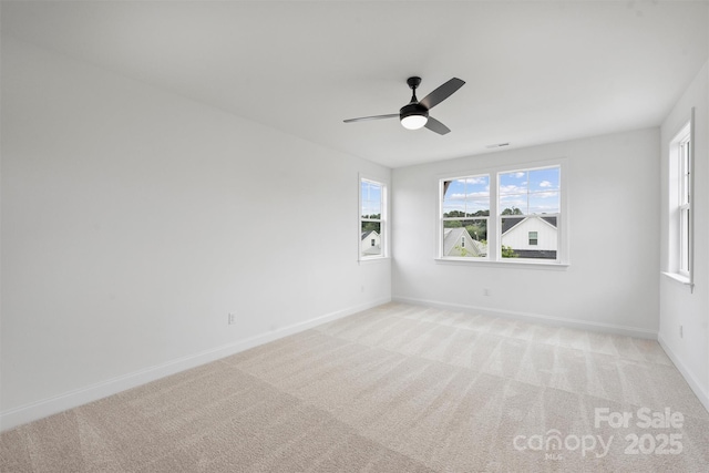 13618 Tranquil Day Dr, Matthews, NC 28105 - unfurnished room with ceiling fan, light colored carpet, and baseboards