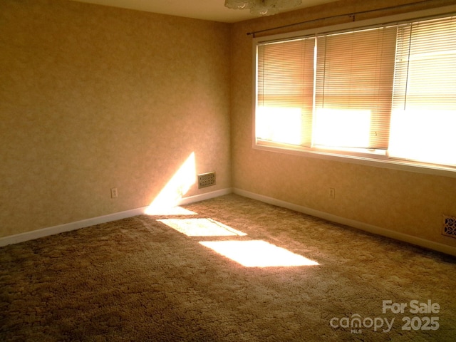 2583 Robinson Rd, Newton, NC 28658 - empty room featuring carpet floors and baseboards