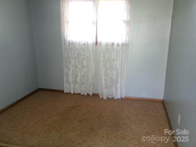 2583 Robinson Rd, Newton, NC 28658 - empty room with carpet floors and baseboards