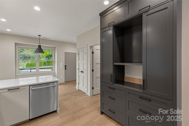 1077 Hicks Rd Unit B, Highlands, NC 28741 - kitchen featuring dishwasher, light wood-style floors, decorative light fixtures, recessed lighting, and light stone countertops
