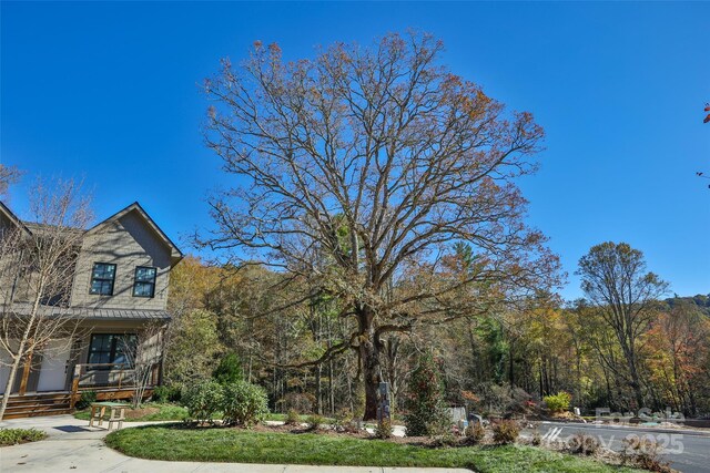 1077 Hicks Rd Unit B, Highlands, NC 28741 - view of front of house featuring covered porch