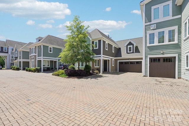 7908 Rea View Ct, Charlotte, NC 28226 - townhome / multi-family property with a residential view, an attached garage, and driveway