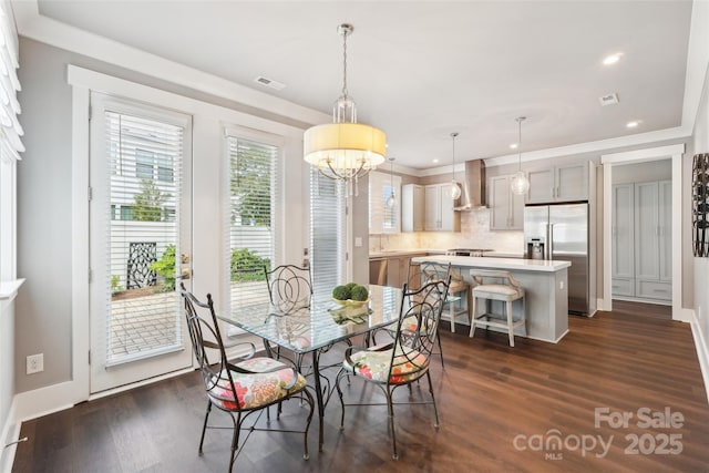7908 Rea View Ct, Charlotte, NC 28226 - dining space with dark wood-style flooring, recessed lighting, a chandelier, and baseboards