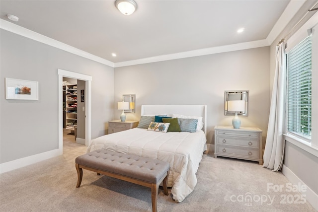 7908 Rea View Ct, Charlotte, NC 28226 - bedroom featuring light colored carpet, a spacious closet, crown molding, recessed lighting, and baseboards