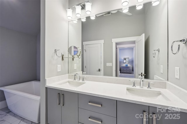 7908 Rea View Ct, Charlotte, NC 28226 - bathroom with a freestanding tub, double vanity, and marble finish flooring