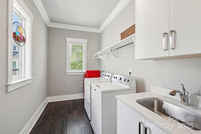 7908 Rea View Ct, Charlotte, NC 28226 - washroom with washing machine and dryer, cabinet space, dark wood-style floors, crown molding, and baseboards