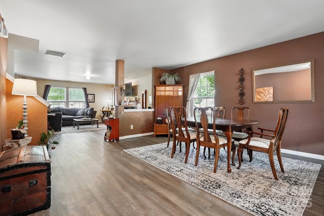 1332 Waterlily Ln, Charlotte, NC 28262 - dining space with wood finished floors and baseboards