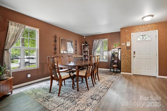 1332 Waterlily Ln, Charlotte, NC 28262 - dining space featuring wood finished floors and baseboards