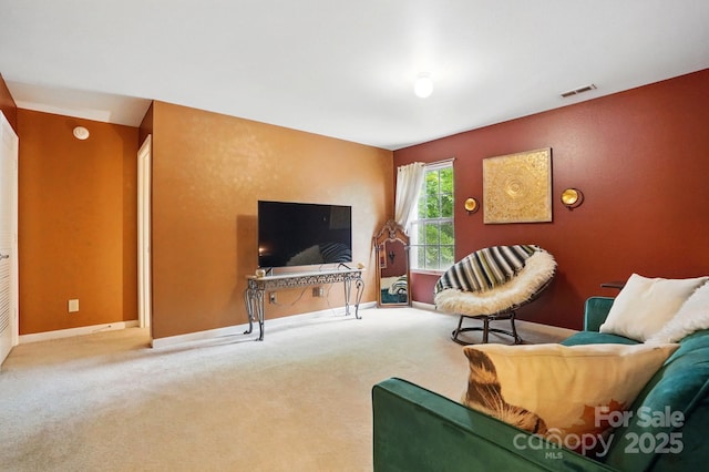 1332 Waterlily Ln, Charlotte, NC 28262 - living room with baseboards and carpet floors