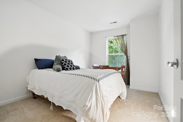 1332 Waterlily Ln, Charlotte, NC 28262 - bedroom featuring light colored carpet and baseboards