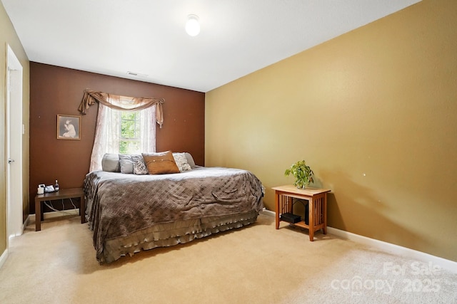 1332 Waterlily Ln, Charlotte, NC 28262 - carpeted bedroom featuring baseboards