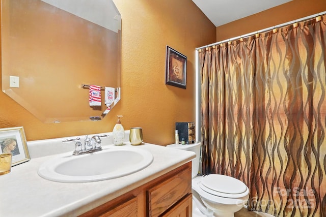 1332 Waterlily Ln, Charlotte, NC 28262 - full bathroom featuring vanity, toilet, a textured wall, and curtained shower