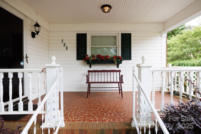 property entrance with a porch
