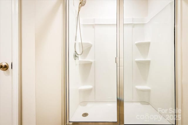 bathroom featuring a stall shower