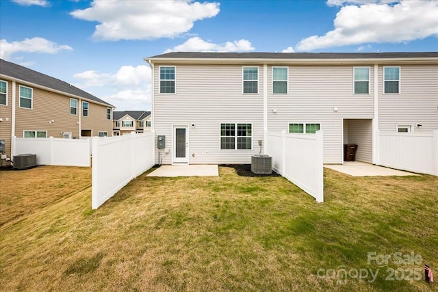 rear view of property featuring a patio and central AC unit