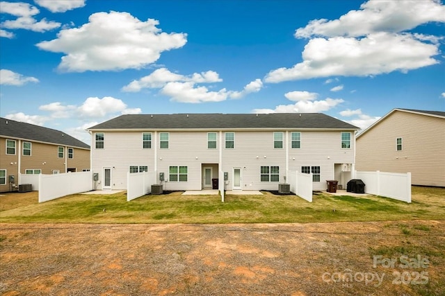 back of property featuring a patio and central AC